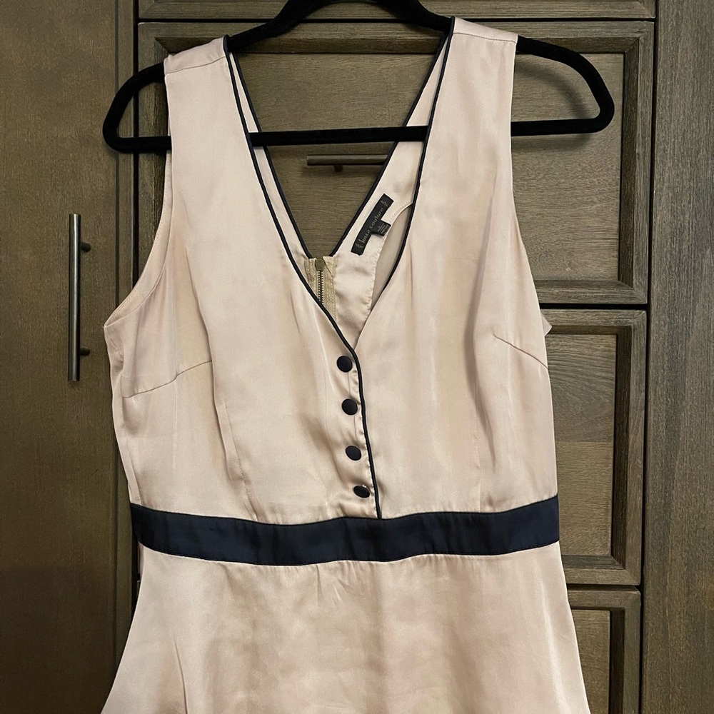 Elegant Cream Dress with Black Accents